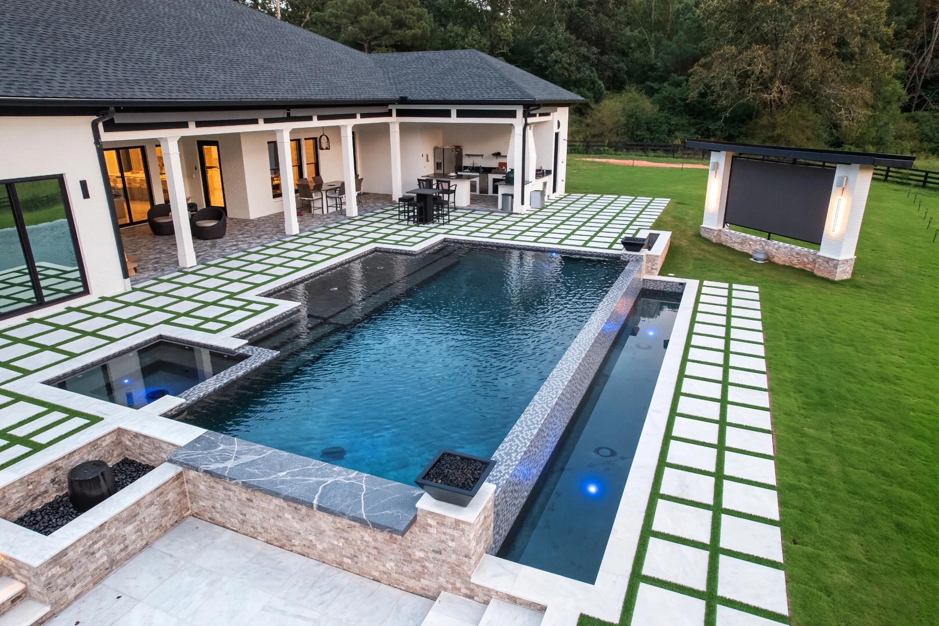 Neway Pools custom pool with spa and outdoor kitchen